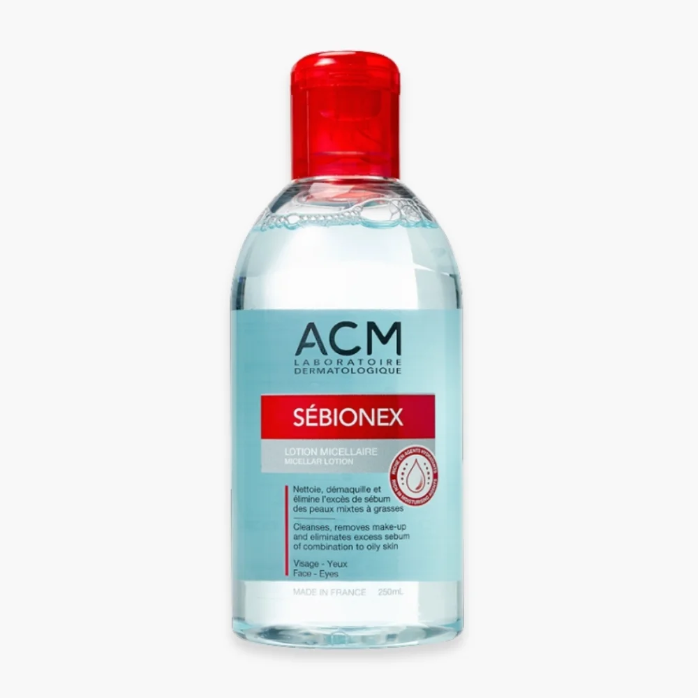 acm-sebionex-lotion-micellaire-250ml.jpg Flacon transparent bouchon rouge ACM Sébionex lotion micellaire 250 ml visage yeux