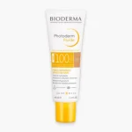 Tube blanc Bioderma Photoderm Fluide SPF100 teinte claire, 40 ml