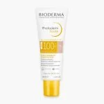 Tube blanc Bioderma Photoderm Fluide SPF100 teinte très claire, 40 ml