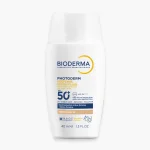 Flacon blanc Bioderma Photoderm XDefense Ultra-Fluide SPF50+ teinte 02, 40 ml