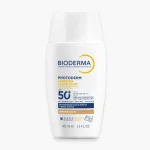 Flacon blanc Bioderma Photoderm XDefense Ultra-Fluide SPF50+ teinte 03, 40 ml