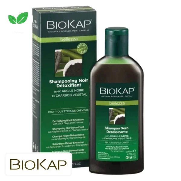 Flacon et étui verts Biokap Bellezza shampooing noir détoxifiant, charbon illustré