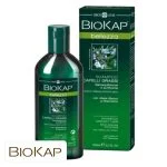 Flacon et étui verts Biokap Bellezza shampooing cheveux gras, romarin illustré