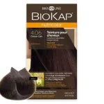 Étui Biokap Nutricolor 4.06 Châtain Café 140 ml avec mèche de cheveux colorée