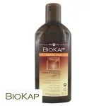 Flacon brun Biokap Nutricolor shampooing restructurant cheveux colorés 200 ml