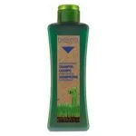 Flacon vert Biokera Natura shampooing hydratant, étiquette kraft et triangle bleu