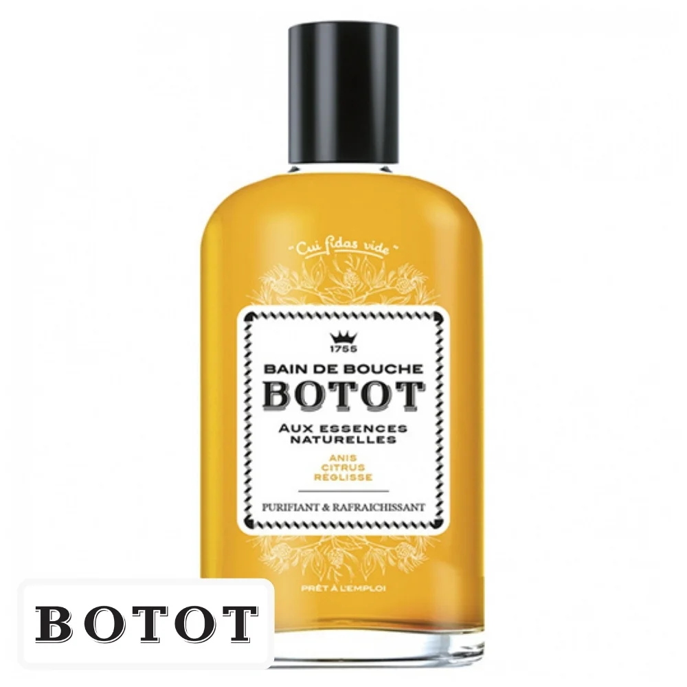 botot-bain-de-bouche-anis-citrus-et-reglisse-250ml.jpg Flacon ambré de bain de bouche Botot, étiquette blanche et bouchon noir