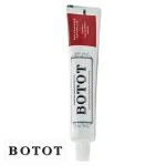 Tube blanc de dentifrice Botot avec bandeau rouge et bouchon blanc
