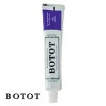 Tube blanc de dentifrice Botot avec bandeau violet et bouchon blanc