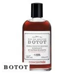 Flacon en verre d'eau de bouche Botot concentrée ambrée, étiquette blanche