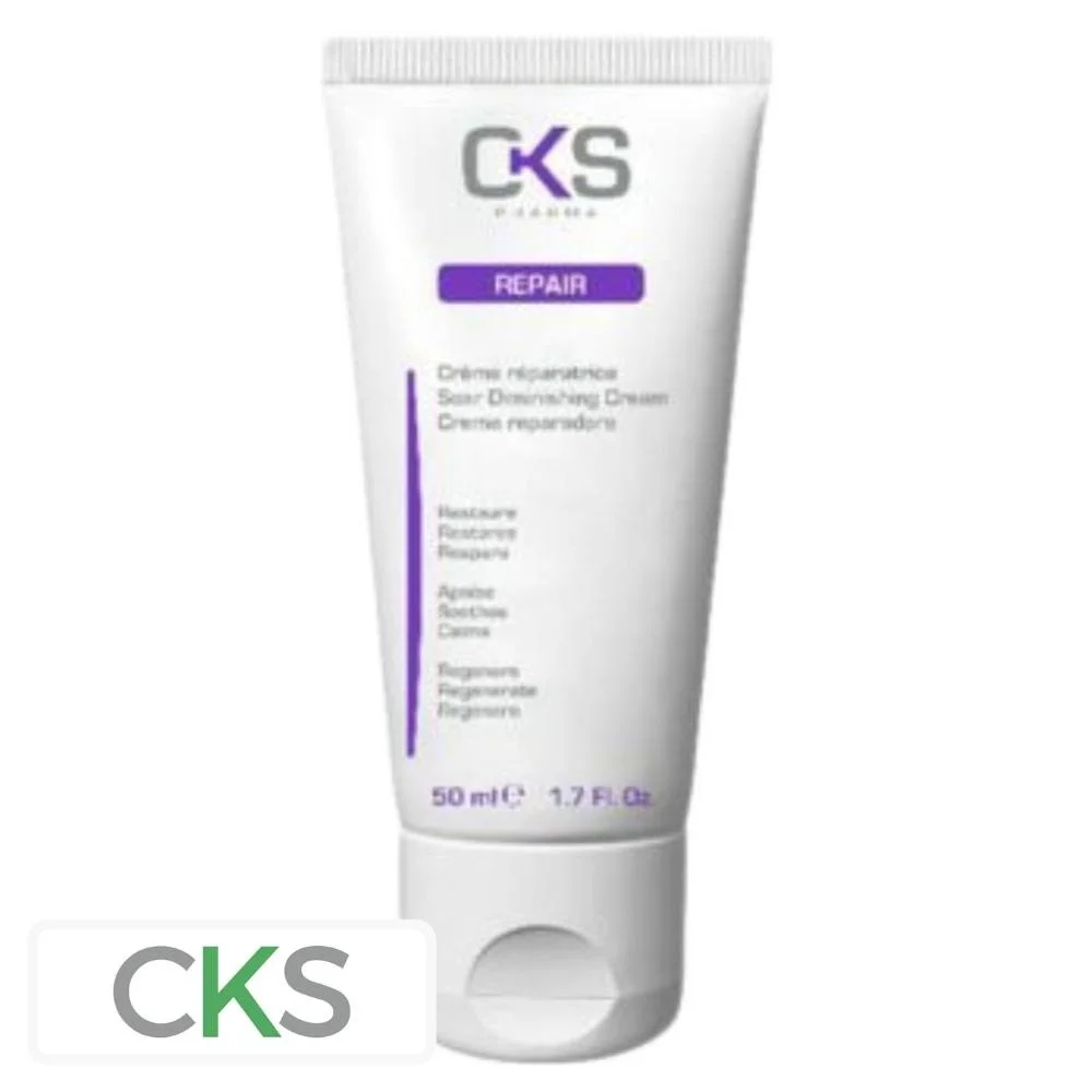 cks-repair-creme-reparatrice-50ml.jpg Tube blanc CKS Pharma Repair crème réparatrice avec liseré violet