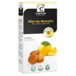 Boîte noire et blanche de huit pastilles gorge miel de Manuka citron