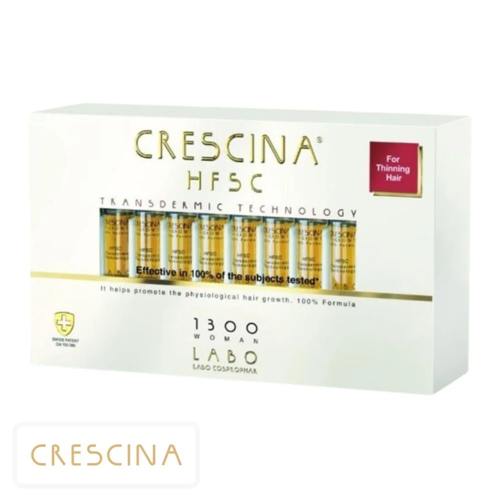 crescina-hfsc-femme-1300-traitement-cheveux-fins-ampoules-20u.jpg Étui blanc et doré Crescina HFSC 1300 Woman, vingt ampoules ambrées visibles