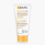 Tube blanc D-Biotic crème solaire SPF50+ 75 ml, bouchon orange