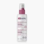 Flacon spray blanc et rose D-Biotic Rosabiotic lotion soin intense 100 ml