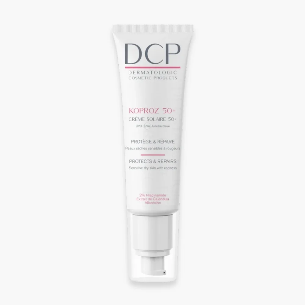 dcp-koproz-creme-solaire-peau-sensible-spf50-50ml.jpg Tube pompe blanc DCP Koproz crème solaire SPF 50+ 50 ml