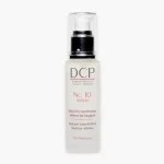 Flacon pompe blanc sérum DCP Nc 10, texte rose sur verre dépoli