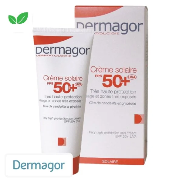 Tube et étui rouge et blanc Dermagor crème solaire FPS 50+ UVA visage