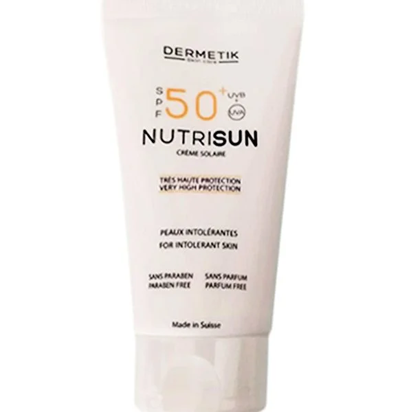 Tube beige Dermetik Nutrisun crème solaire SPF 50+ peaux intolérantes