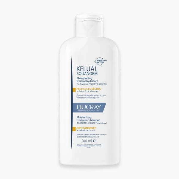 Flacon blanc Ducray Kelual Squanorm shampooing pellicules sèches 200 ml