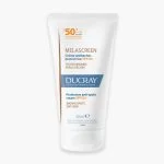 Tube blanc et doré Ducray Melascreen crème antitaches protectrice SPF50+ 50 ml