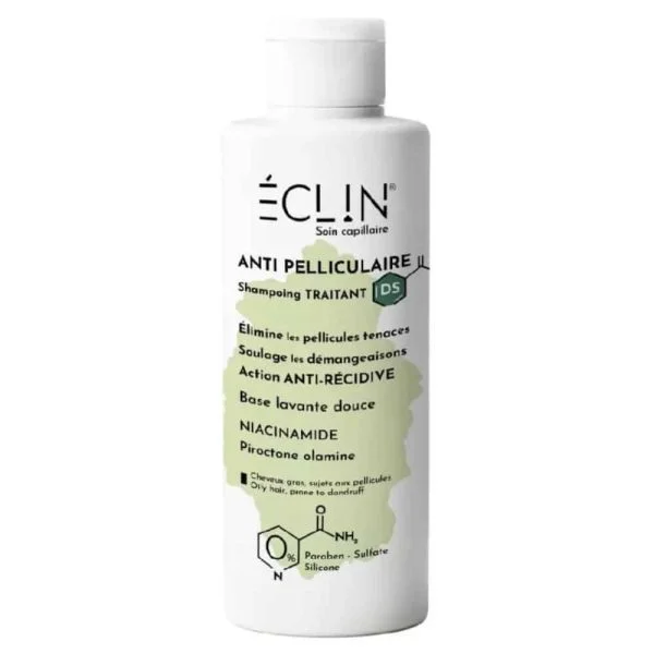Flacon blanc de shampoing anti-pelliculaire Éclin DS avec étiquette verte
