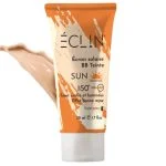Tube orange de l'écran solaire BB teinté SPF50+ Éclin avec texture beige