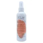 Flacon spray blanc de la lotion anti-chute Éclin avec étiquette orange