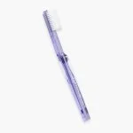 Brosse à dents Elgydium Classic medium manche parme translucide filaments blancs