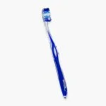 Brosse à dents Elgydium Inspiration manche bleu translucide filaments bleus et blancs