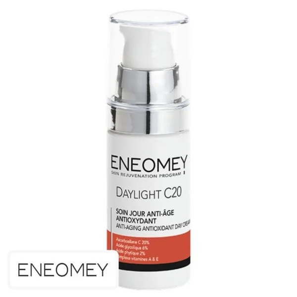 Flacon pompe blanc et orange Eneomey Daylight C20 soin de jour 30 ml