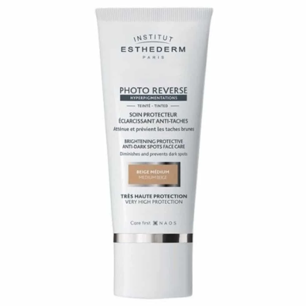 esthederm-photo-reverse-soin-protecteur-eclaircissant-anti-taches-teinte-beige-medium-50ml.jpg Tube blanc Esthederm Photo Reverse soin teinté beige médium anti-taches