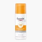 Flacon pompe Eucerin Sun Photoaging Control SPF50+ blanc et orange