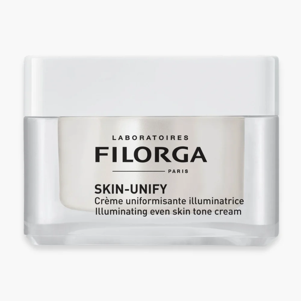 filorga-skin-unify-creme-uniformisante-illuminatrice-50ml.jpg Pot blanc Filorga Skin-Unify, crème uniformisante illuminatrice, texture blanche, 50 ml
