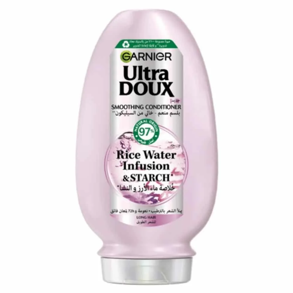 garnier-ultra-doux-apres-shampoing-rice-water-200ml.jpg Flacon rose Garnier Ultra Doux après-shampoing lissant eau de riz et amidon