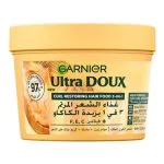 Pot beige Garnier Ultra Doux Hair Food beurre de cacao cheveux bouclés secs