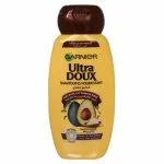 Flacon jaune Garnier Ultra Doux shampooing nourrissant avocat et karité