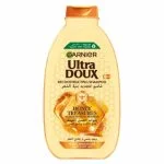 Grand flacon jaune Garnier Ultra Doux shampooing miel d'acacia cire d'abeille