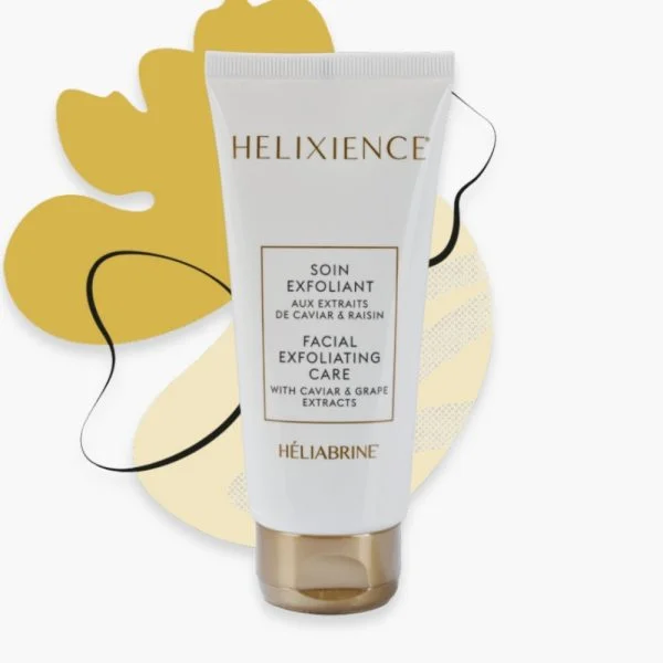Tube blanc Hélixience Héliabrine soin exfoliant visage 75 ml, fond jaune