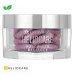 Pot transparent Heliocare Purewhite Radiance, capsules roses, couvercle argenté