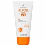Tube blanc Heliocare Ultra 90 Gel SPF50+, bouchon orange, écran solaire visage