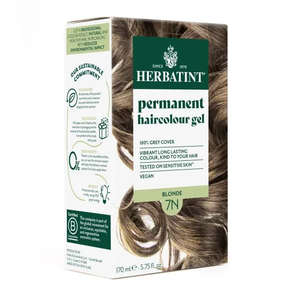 Boîte Herbatint coloration permanente 7N blond avec cheveux châtain-blond ondulés