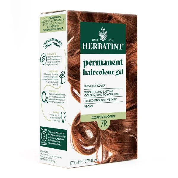 Boîte Herbatint coloration permanente 7R blond cuivré avec cheveux cuivrés ondulés
