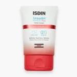 Tube blanc et rouge ISDIN Ureadin Manos Plus Repair crème mains, bouchon rouge