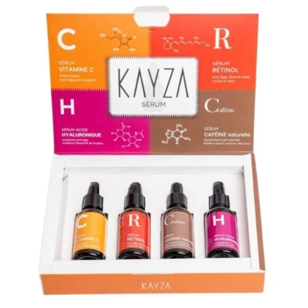 Coffret ouvert Kayza avec quatre sérums vitamine C rétinol caféine hyaluronique