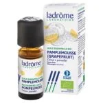 Flacon ambré Ladrôme Huile Essentielle Bio Pamplemousse et étui illustré d'agrumes jaunes