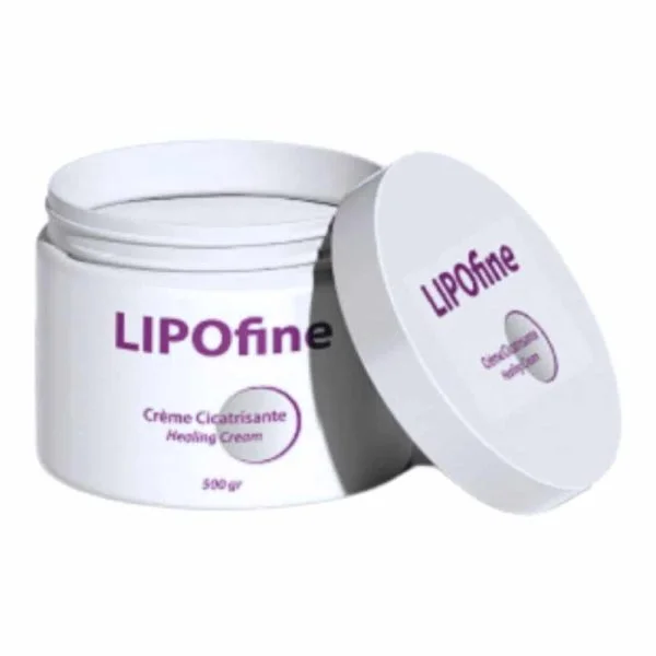 Pot blanc Lipofine 500g, crème cicatrisante, couvercle ouvert posé à côté