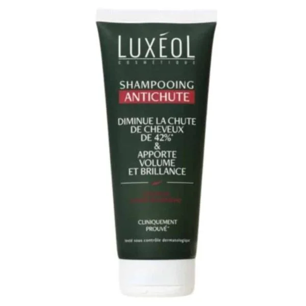 Tube vert foncé Shampooing Antichute Luxéol, bandeau rouge, bouchon blanc
