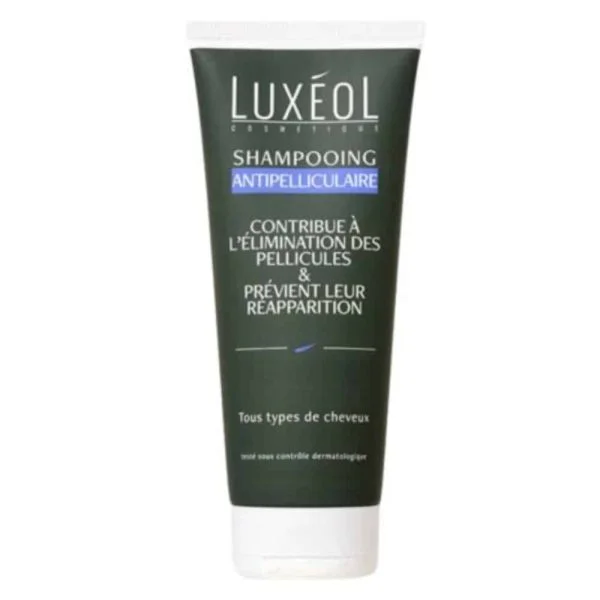 Tube vert foncé Shampooing Antipelliculaire Luxéol, bandeau bleu, bouchon blanc