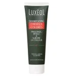 Tube vert foncé Shampooing Cheveux Colorés Luxéol, bandeau rouge, bouchon blanc